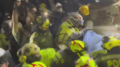 Cheers erupt as woman pulled from rubble in Colombia after 36 hours Cheers erupt as woman pulled from rubble in Colombia after 36 hours