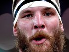 Former Brisbane Broncos champion Josh McGuire has been charged for two alleged incidents against a child.
