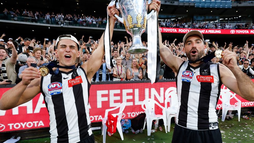 Steele Sidebottom celebrates the 2023 grand final with Nick Daicos. 