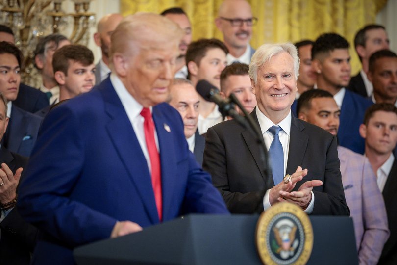 U.S. President Donald Trump accompanied by former Lakers owner Chairman Mark Walter.