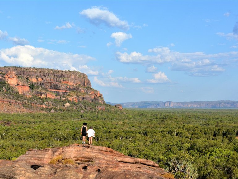 A day trip to one of Kakadu’s most celebrated lookouts has ended in tragedy, with a woman in her 30s dying at Ubirr as police work to determine what happened.