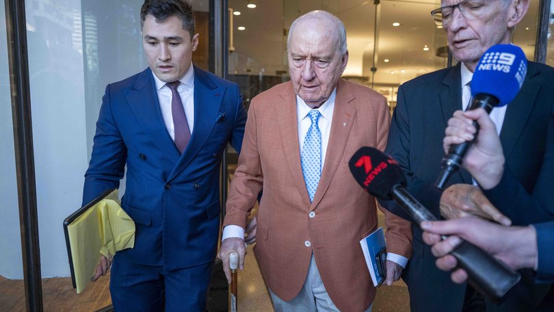 Veteran broadcaster Alan Jones leaves Downing Centre Court as he battles allegations he sexually touched and indecently assaulted six men. 