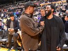 Denzel Washington and John David Washington at a Lakers game