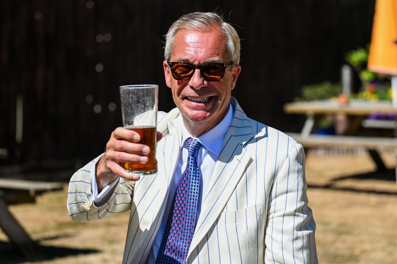 Nigel Farage drinks a pint at The Ship pub in Clacton.