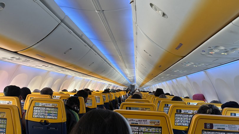 Engine debris behind Ryanair passenger window nightmare.
