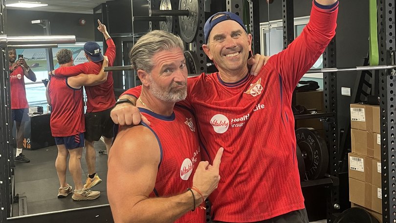 Justin Langer with strength and conditioning coach Darren Veness.