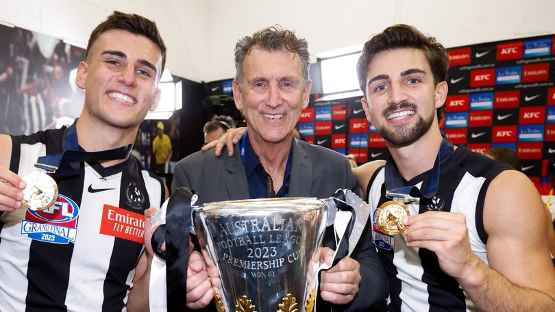 Nick, Peter and Josh Daicos celebrate Collingwood’s premiership in 2023, just over a year after he was secretly diagnosed with cancer.