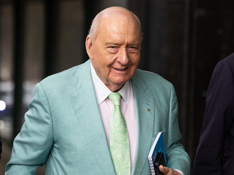 Former radio broadcaster Alan Jones arrives at Downing Centre Local Court in Sydney on Monday.