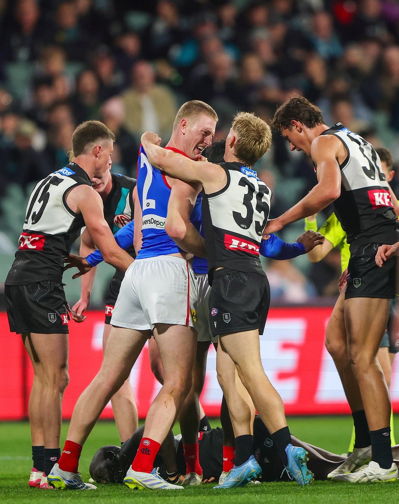 Power players remonstrating after the hit.