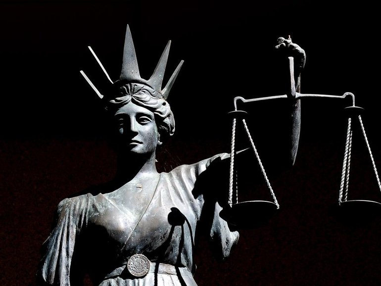 The decision to grant parole to a man who killed four people in the 1980s is set to be reviewed. 