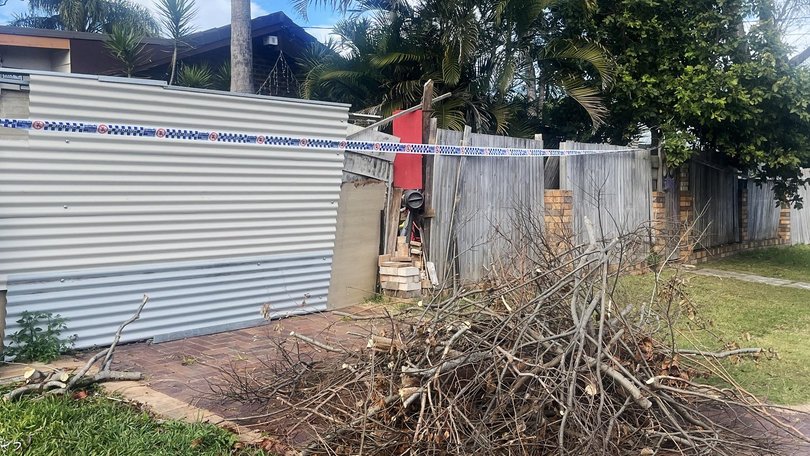 A crime scene has been established after the remains of a man who went missing four years ago were found in a home at Bethania. Picture: Kyle Rode.