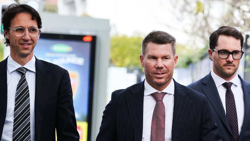 David Warner arrives to Waverley Court with his legal team on Tuesday.