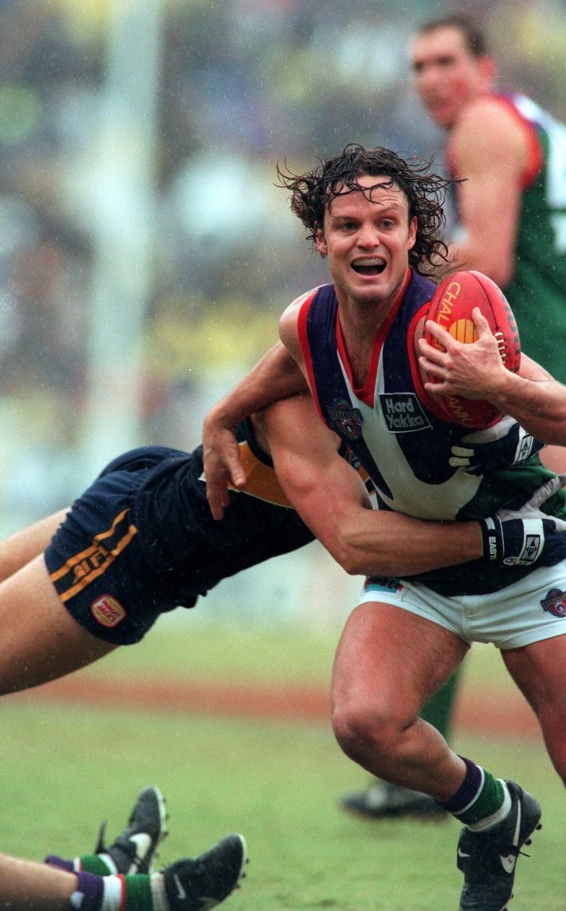 Fremantle Docker Scott Watters in action against West Coast Eagles.