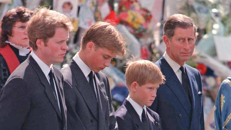 Charles Spencer, Prince William, Prince Harry and Prince Charles standing together outside Westminster Abbey during funeral of Princess Diana.   