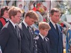 Charles Spencer, Prince William, Prince Harry and Prince Charles standing together outside Westminster Abbey during funeral of Princess Diana.   