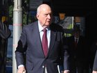 Alan Jones arrives at Downing centre court as his trial on charges of indecent assault continues.

