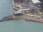 Three members of the same family have died and a fourth is fighting for life after they were swept into difficulty at a beach in England.