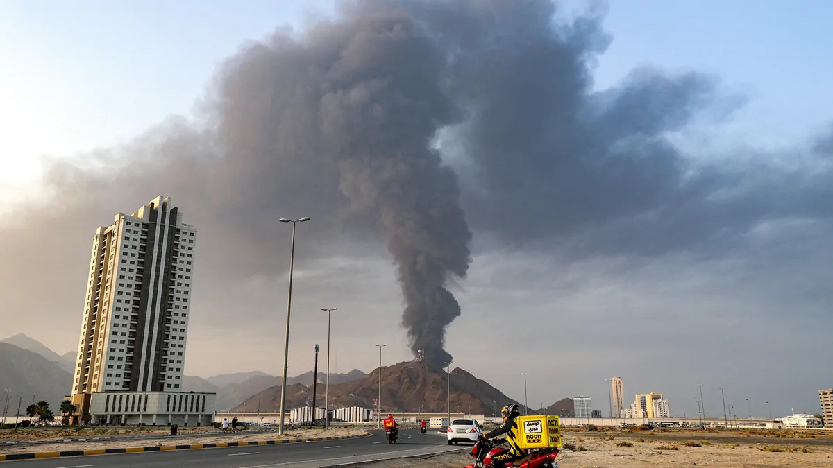 Middle East latest: United Arab Emirates suspends trade with Iran after coming under renewed missile fire