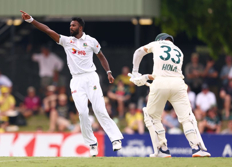 Ebadot Hossain of Bangladesh celebrates after taking the wicket of Marnus Labuschagne.