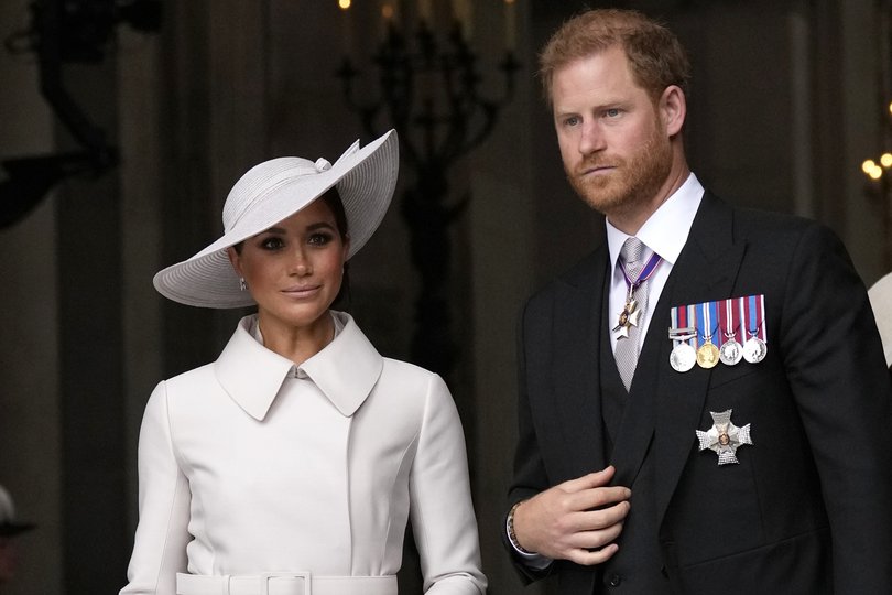 Prince Harry and Meghan Markle, Duke and Duchess of Sussex leave after a service of thanksgiving for the reign of Queen Elizabeth II at St Paul's Cathedral in London, Friday, June 3, 2022.