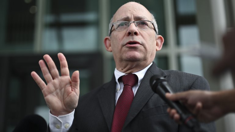 Israel’s Ambassador to Australia Hillel Newman holds outside Parliament House in Canberra on Thursday.
