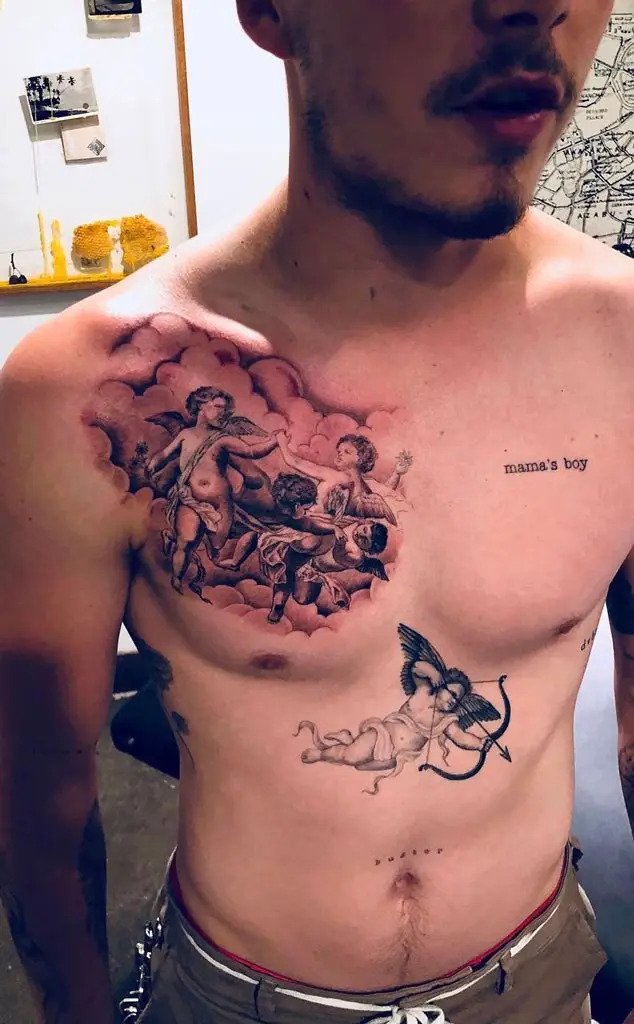 He had a tattoo of "mama's boy" on his chest.