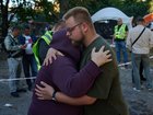 Kyiv residents comforted each other amid the carnage of a massive Russian barrage. 