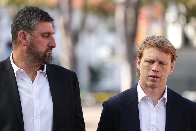 SYDNEY, AUSTRALIA - AUGUST 21: Dean Cox, coach of the Sydney Swans and Callum Mills speak to the media during a Sydney Swans AFL press conference at Sydney Swans HQ on August 21, 2026 in Sydney, Australia. (Photo by Darrian Traynor/Getty Images)
