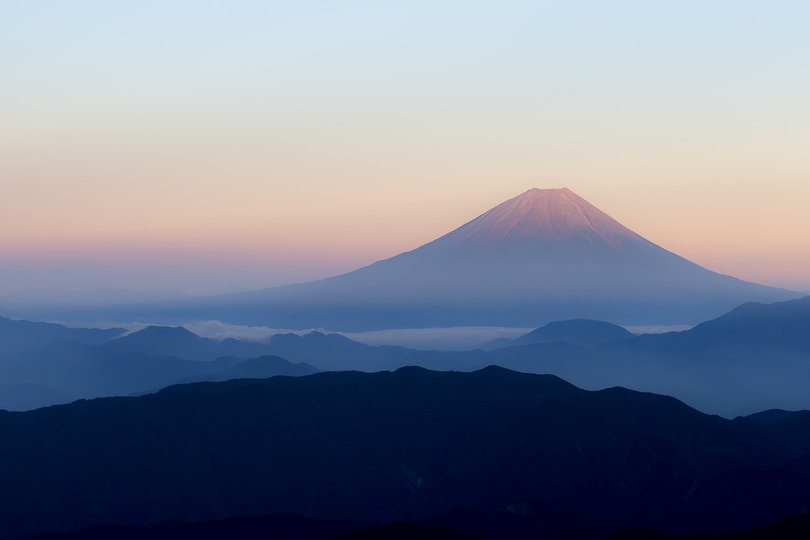 A family hiking trip on Mount Fuji has ended with police intervention after a father allegedly left his seven-year-old son alone on the mountain.