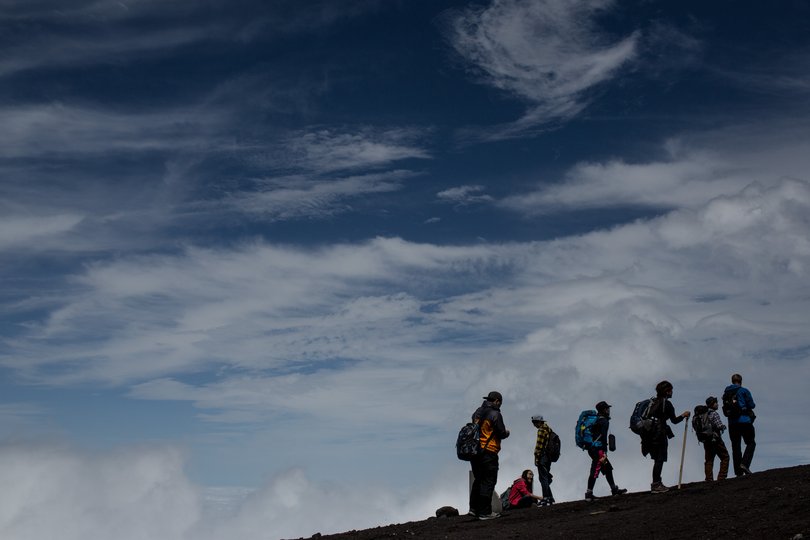 The 48-year-old man from Nagoya was climbing the Fujinomiya Trail with his two sons on Thursday when the younger child, an elementary school student, reportedly complained that he was exhausted.