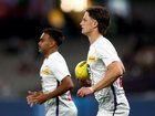 MELBOURNE, AUSTRALIA - AUGUST 22: Neil Erasmus and Isaiah Dudley of the Dockers warm up ahead of the round 24 AFL match between Carlton Blues and Fremantle Dockers at Marvel Stadium, on August 22, 2026, in Melbourne, Australia. (Photo by Graham Denholm/AFL Photos/via Getty Images)