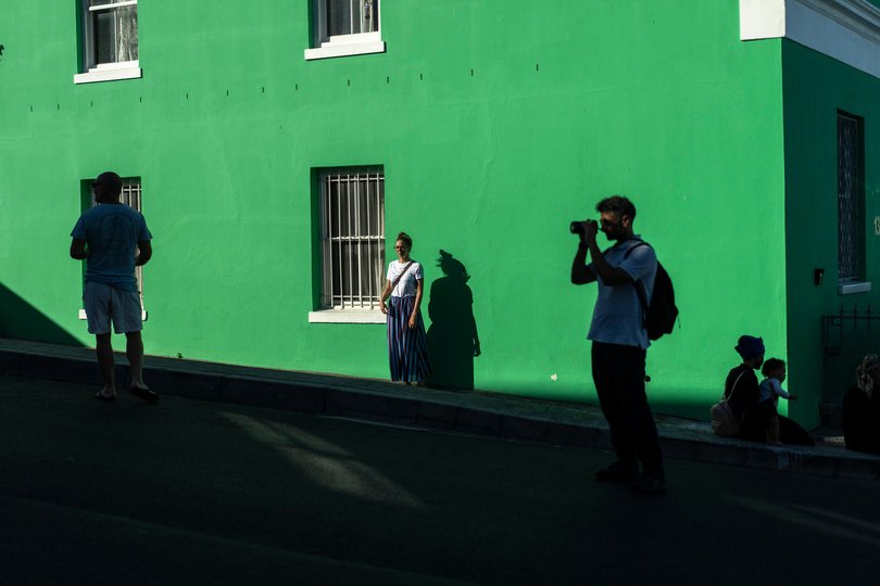 Tourists during a visit to Bo-Kaap, a historical area of Cape Town, South Africa.