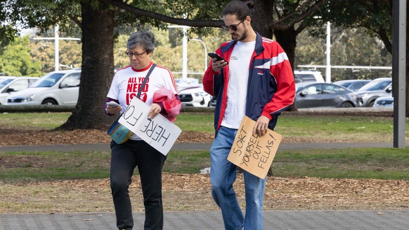 But many fans held protest signs pointing to the scandal that has embroiled the men’s side. Picture: NewsWire / Nadir Kinani