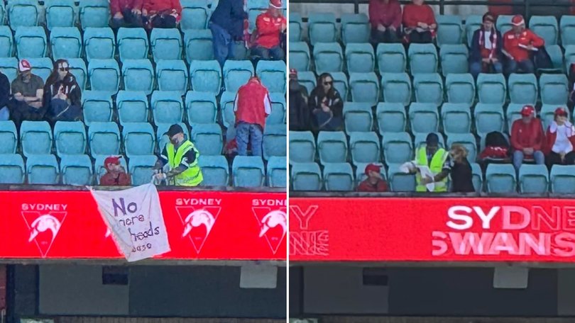 Security spoke with the fan and removed the banner.