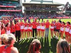 Swans players sing the song after their win.