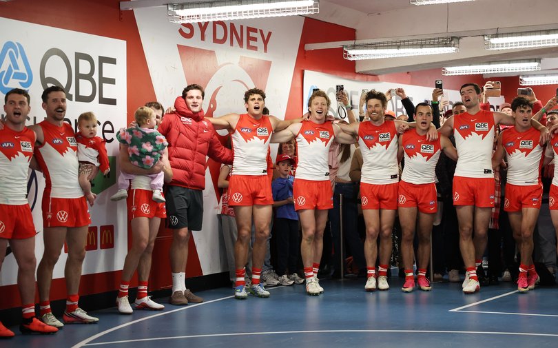 Swans players sing the song.
