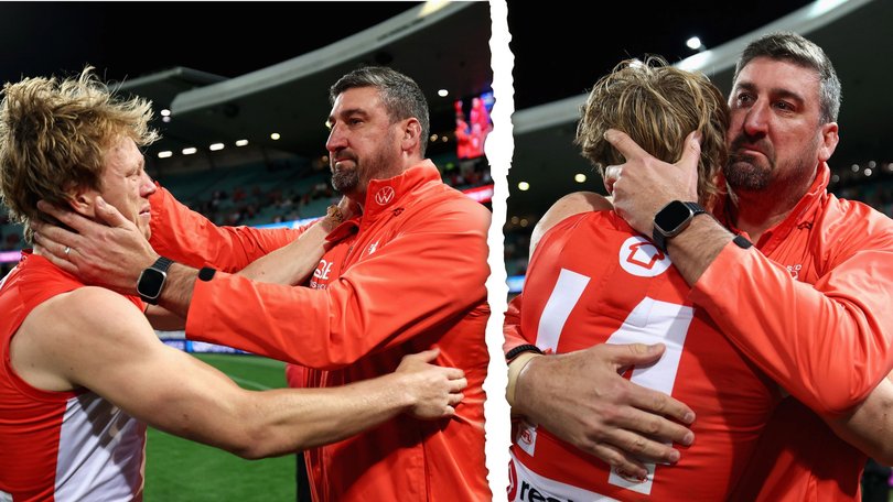 Callum Mills and Dean Cox embrace after Sydney's win.