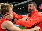 Callum Mills and Dean Cox embrace after Sydney's win.