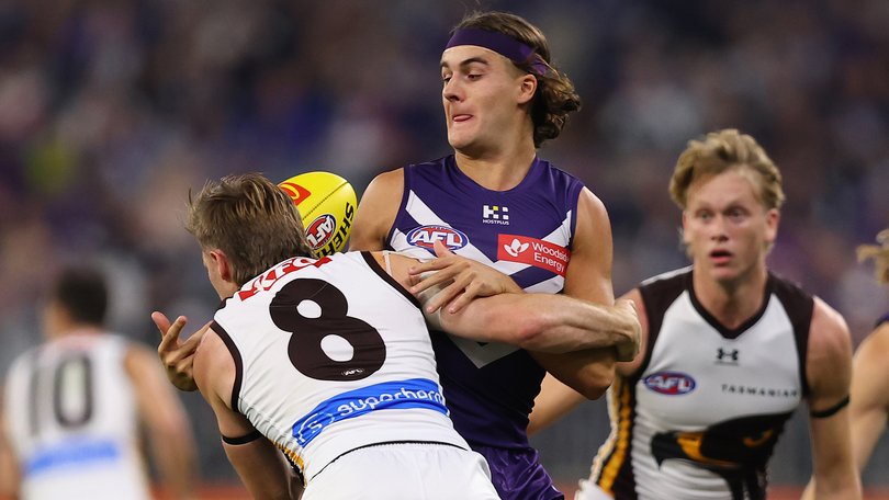 Murphy Reid going up against Dylan Moore when Freo and Hawthorn clashed earlier this year.