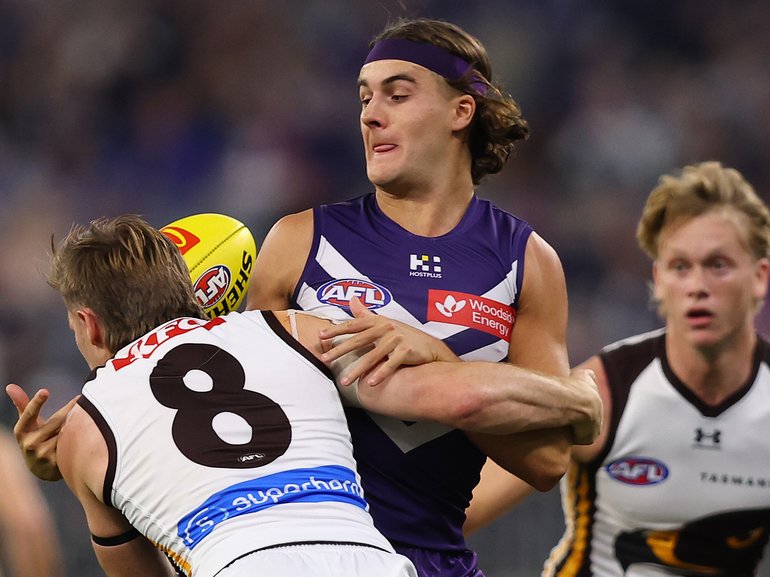 Murphy Reid going up against Dylan Moore when Freo and Hawthorn clashed earlier this year.
