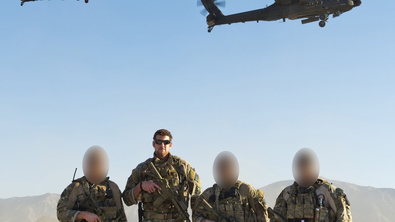 SAS corporal Ben Roberts-Smith and three members of his team in Afghanistan in 2012. Potential witnesses in his war crimes trial will have to apply to a judge to remain anonymous.