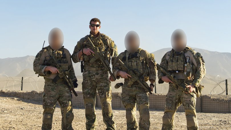 SAS corporal Ben Roberts-Smith and three members of his team in Afghanistan in 2012. Potential witnesses in his war crimes trial will have to apply to a judge to remain anonymous.