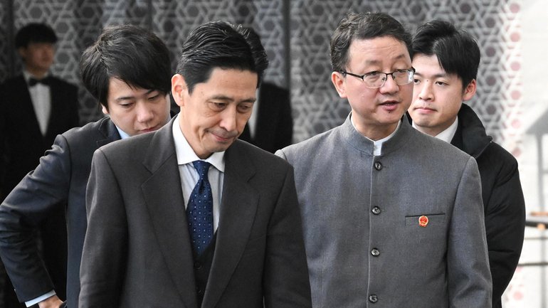 Liu Jinsong, right, China’s new ambassador in Canberra, with Masaaki Kanai  head of the Japanese Foreign Ministry’s Asian and Oceanian Affairs Bureau.