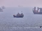 As negotiations over the Strait of Hormuz continue, Iran denounces expanded US sanctions. 