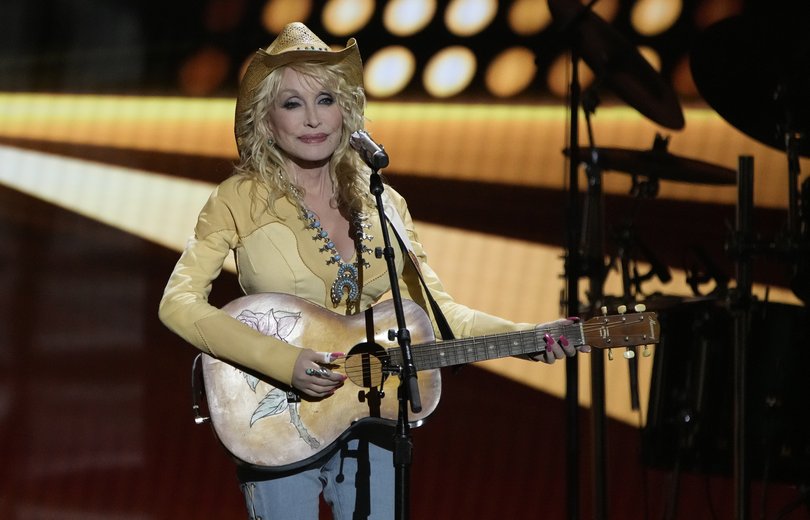 Dolly Parton performs ‘Big Jeans and Faded Dreams’ at the 57th Academy of Country Music Awards.