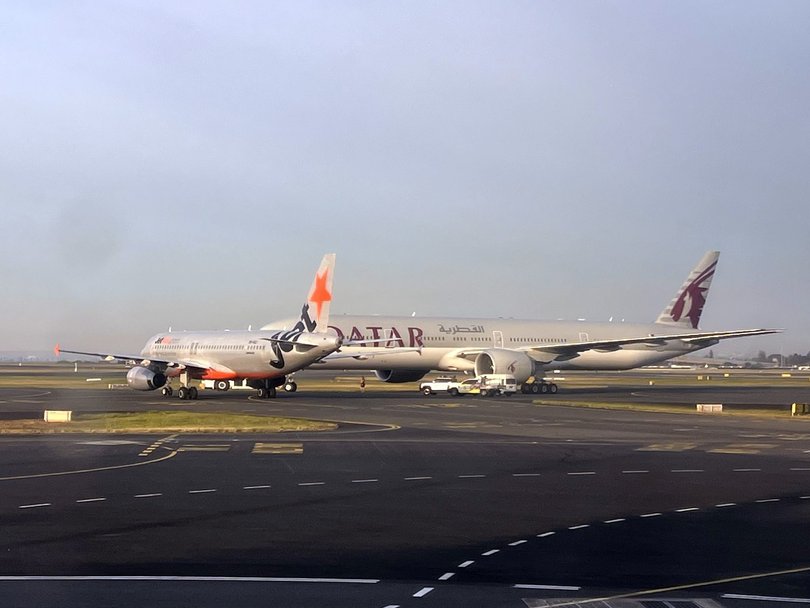 Australia’s aviation industry heads have been summoned for an urgent meeting with the government after two aircraft narrowly avoided a collision at the nation’s busiest airport. A Jetstar flight preparing to depart Sydney Airport for the Gold Coast almost collided with a Qatar Airways plane at 7am on Sunday. The Jetstar Airbus 320 pilot was forced to brake suddenly to avoid a collision with the Qatari plane on the tarmac.