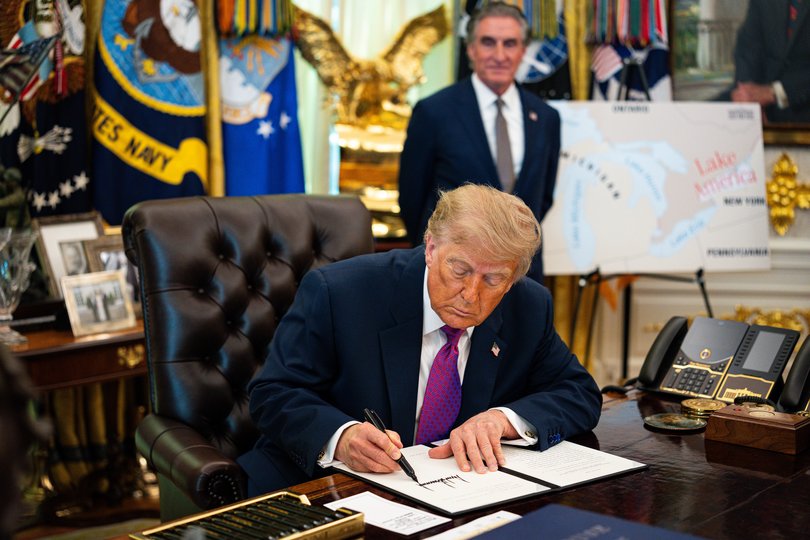 US President Donald Trump signs an executive order in the Oval Office of the White House in Washington, DC, US, on Thursday, Aug. 27, 2026.