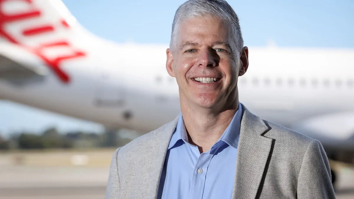 Virgin spared war fuel bill shock, pays out first dividend