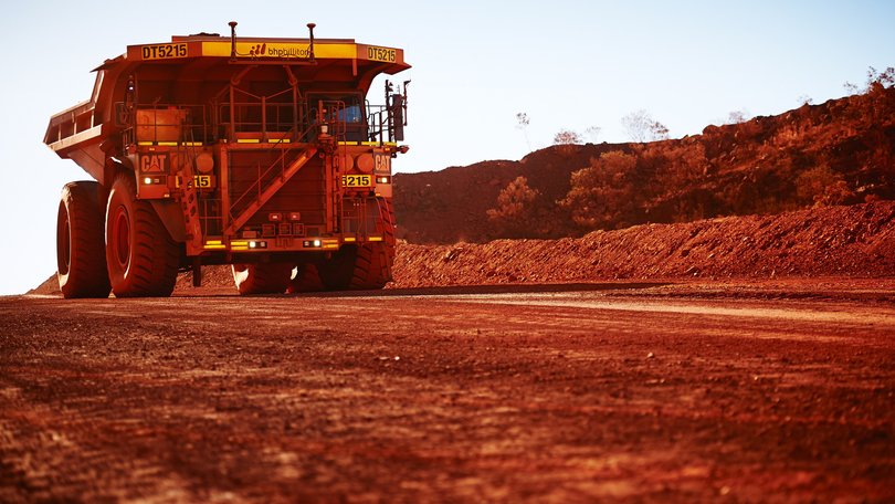 BHP is swinging the axe on a chunk of its 1600-strong workforce at a massive Pilbara iron ore mine.