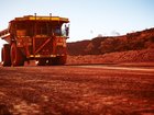 BHP is swinging the axe on a chunk of its 1600-strong workforce at a massive Pilbara iron ore mine.